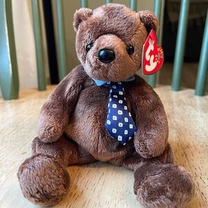Ty Brown Beanie Baby with Blue Patterned Tie— Hero